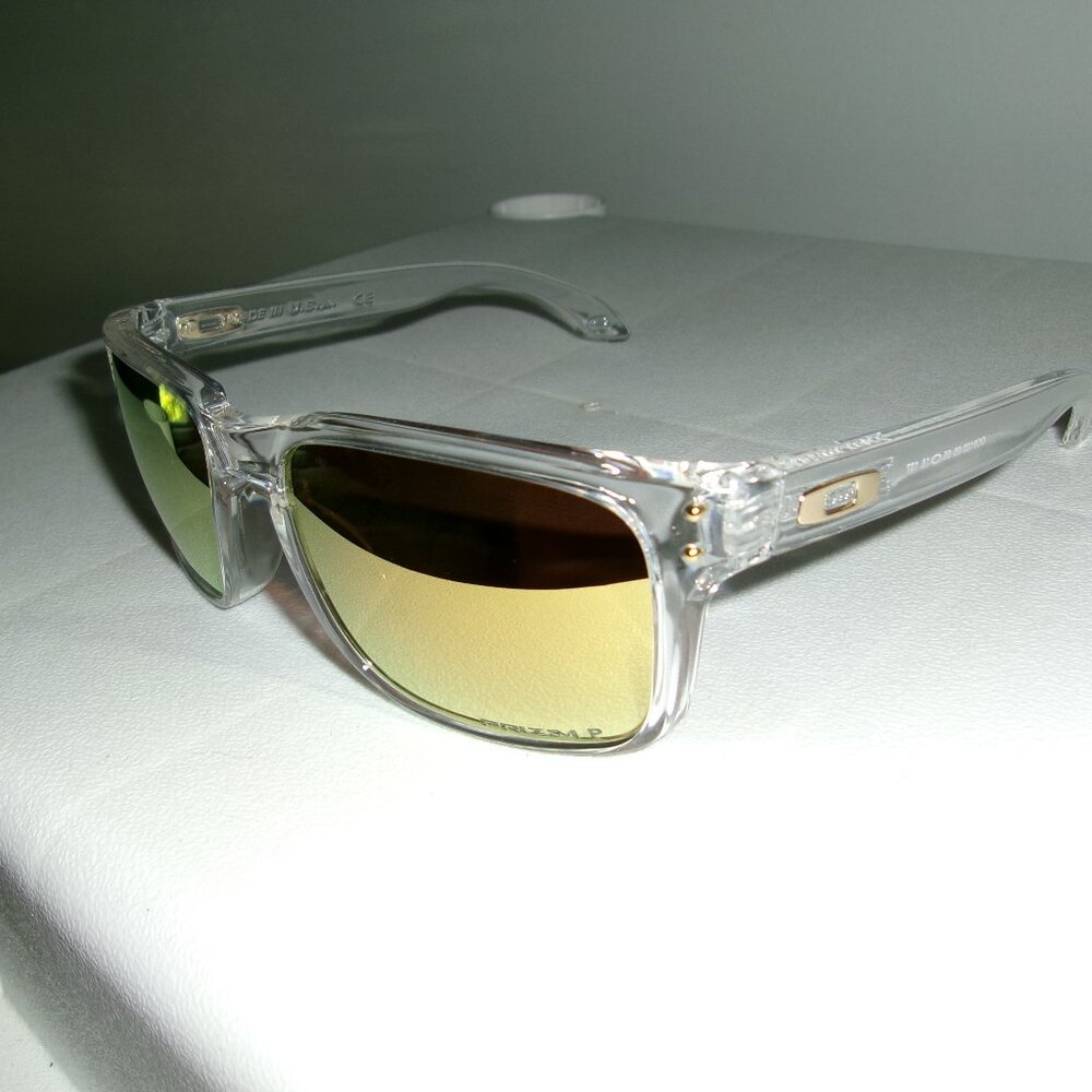 Oakley Sunglasses with Clear Frame and Gold Lenses
